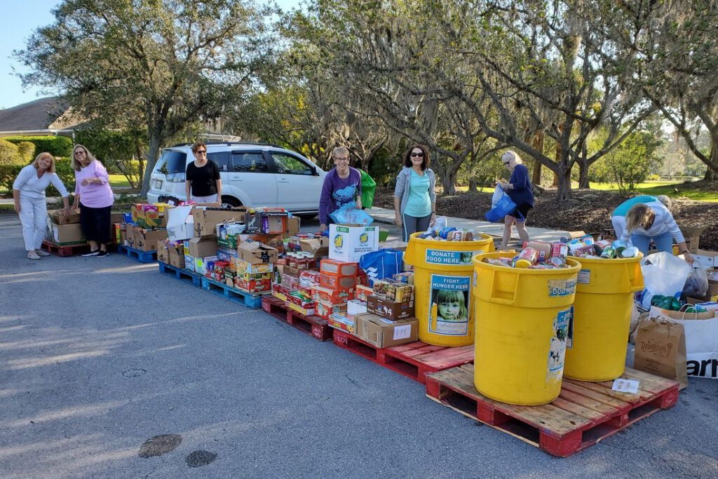 volunteers sorting through donations