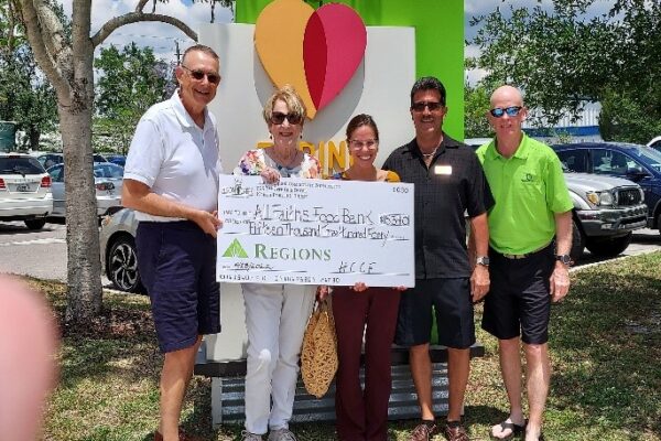 All Faiths Food Bank receiving a grant check from HCCF